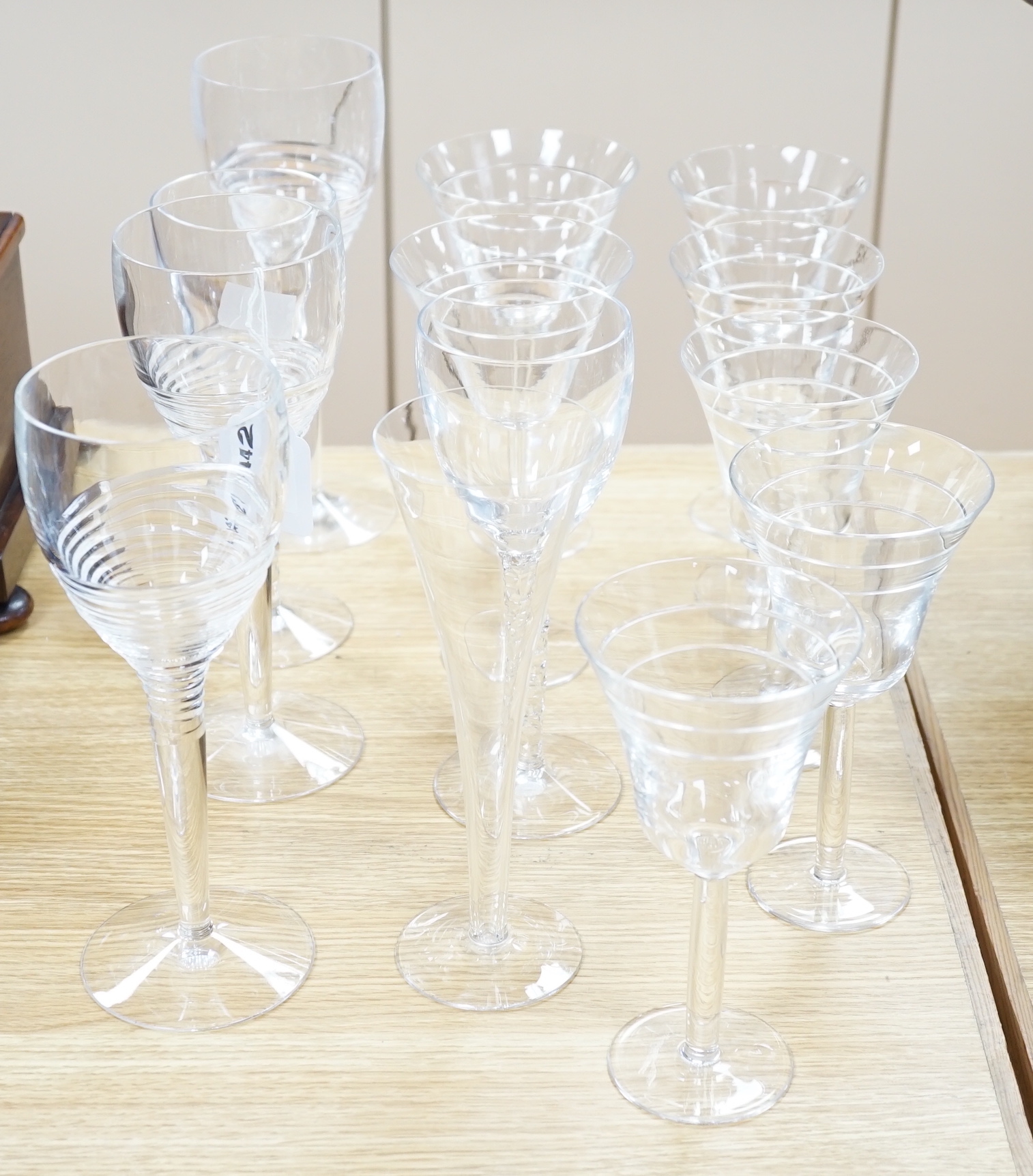 A group of mixed Jasper Conran, Stuart and Tiffany wine and champagne glasses, tallest 25cm high (13)